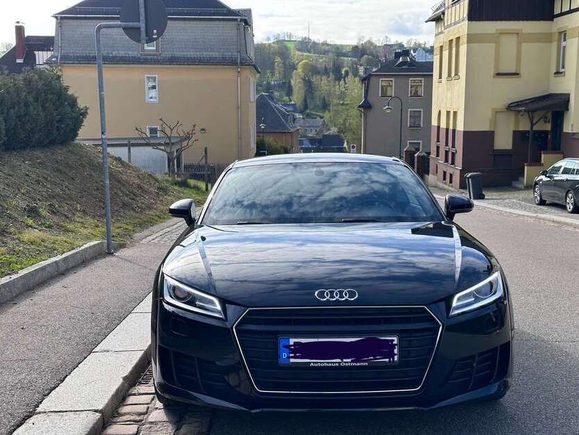 TT
