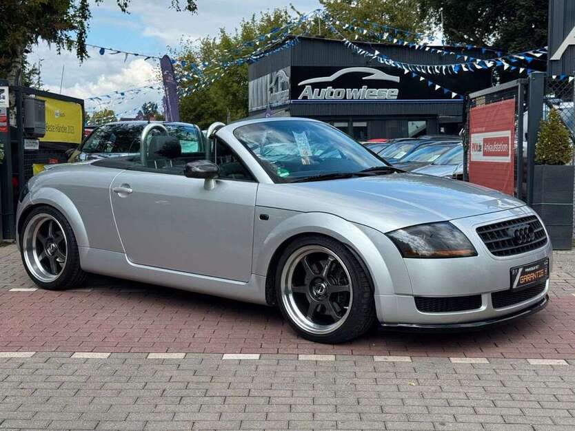 TT
