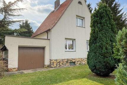 Charmantes Einfamilienhaus mit sechs Zimmern, Dielenboden & Gartenidylle 6 zimmer