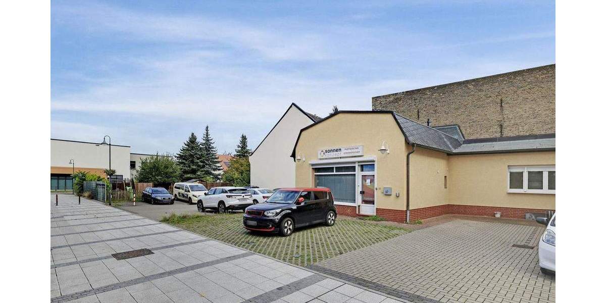 Mehrfamilienhaus mit attraktiver Mischung aus Wohnen, Gewerbe und Stellplätzen in Falkensee zimmer