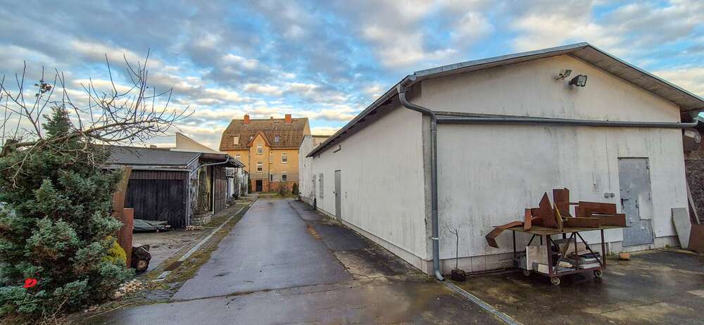 Wohn- & Gewerbeensemble mit Entwicklungspotenzial – Ihre Kapitalanlage mit Flughafennähe 11 zimmer