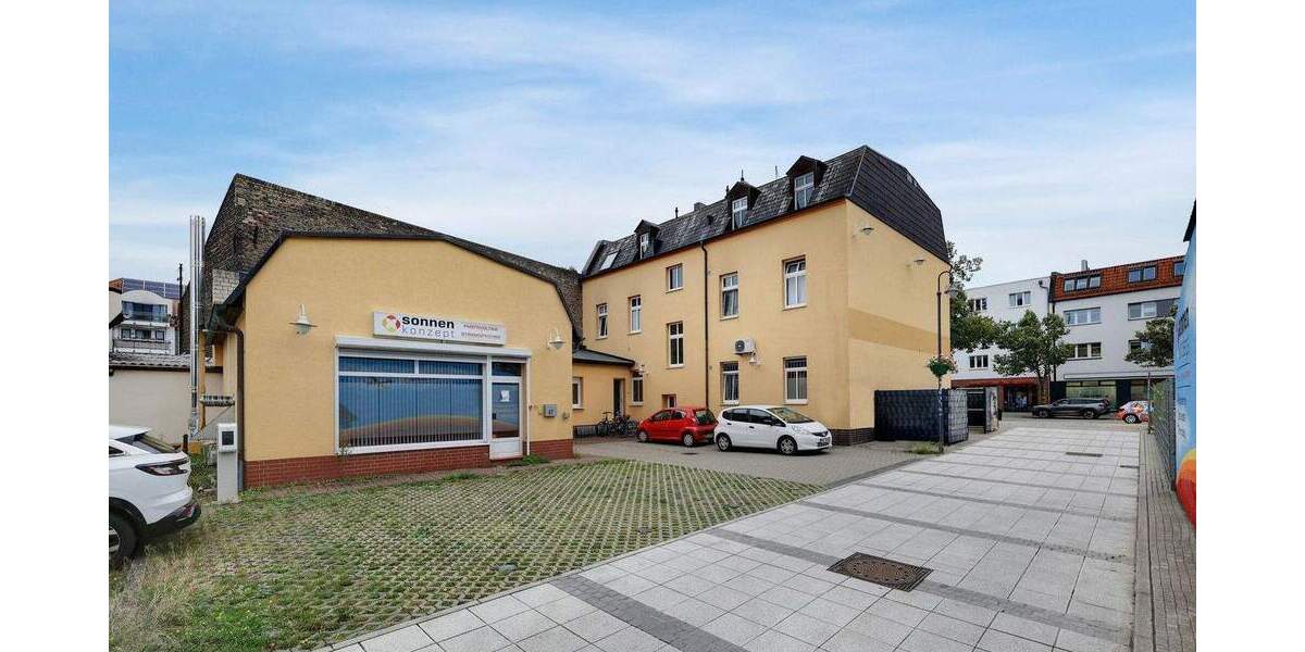 Mehrfamilienhaus mit attraktiver Mischung aus Wohnen, Gewerbe und Stellplätzen in Falkensee zimmer