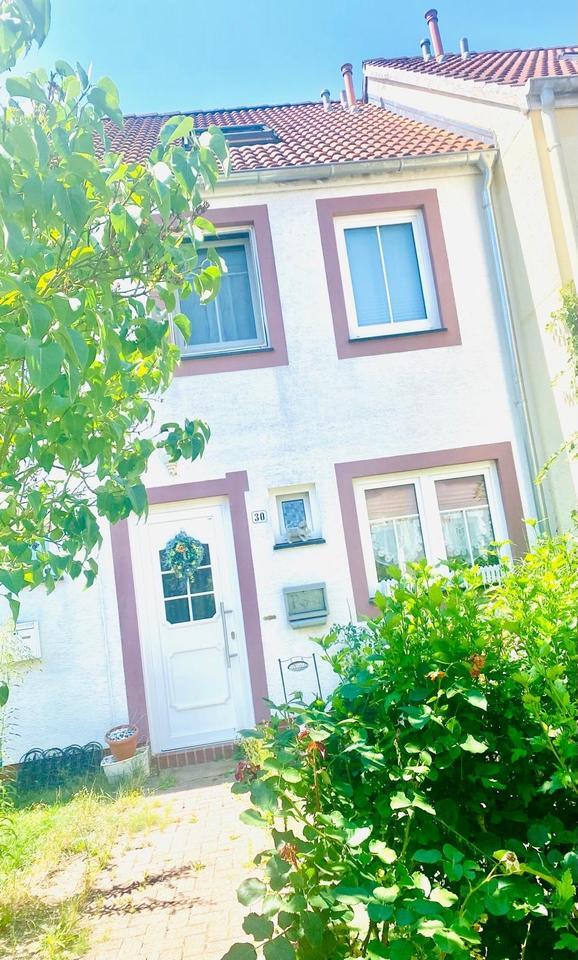 Sonniges Haus Reihenhaus mit Garten und Carport ( Wohnung )