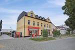 Mehrfamilienhaus mit attraktiver Mischung aus Wohnen, Gewerbe und Stellplätzen in Falkensee zimmer