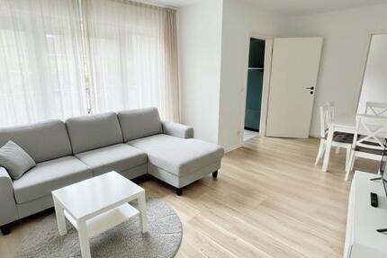 Renovierte und möblierte 2-Z. Wohnung mit Tiefgaragenstellplatz zimmer
